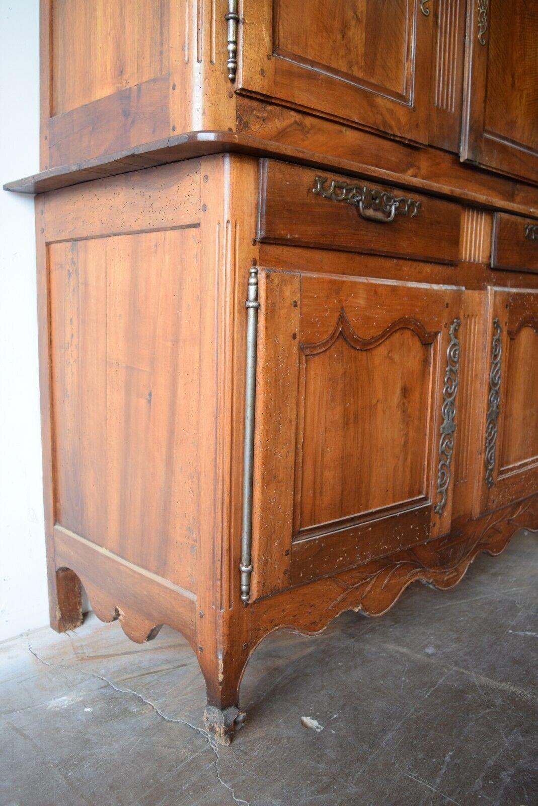 Hand-Carved 19th Century French Louis XV Tall Double Walnut Buffet For Sale