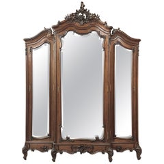 19th Century French Louis XV Walnut Triple Armoire