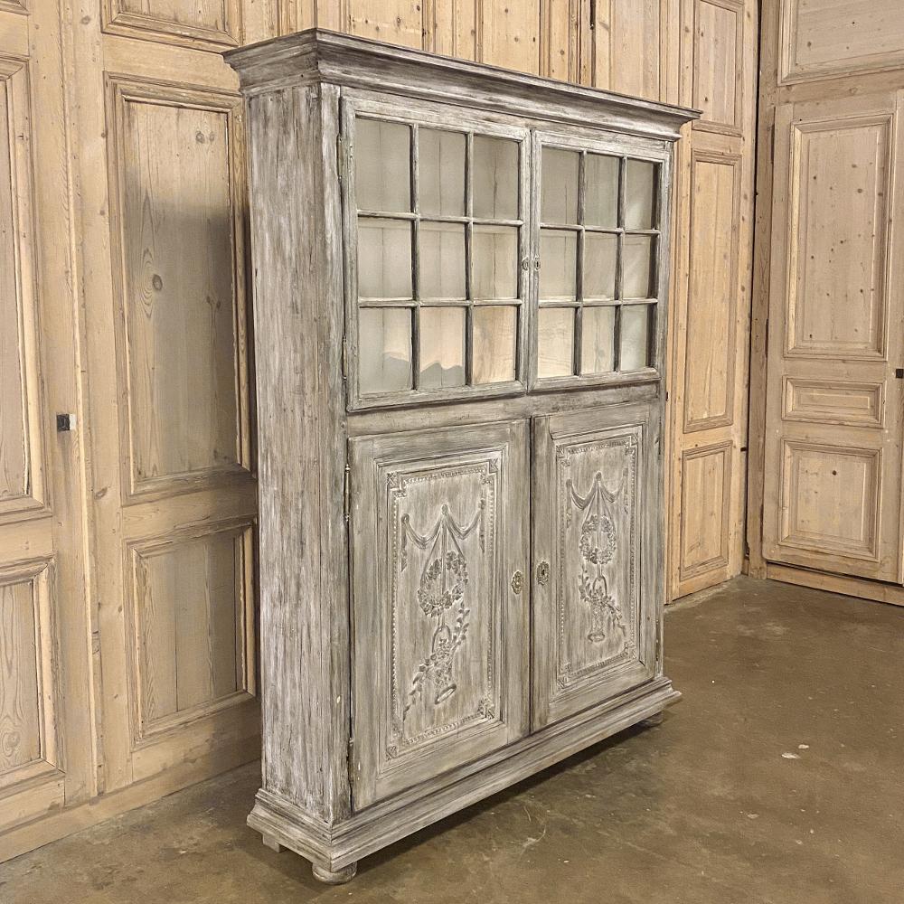 19th century French Louis XVI bookcase ~ display cabinet is a marvelous way to add charm and visual interest, while creating a minimal impact on your room's traffic pattern! Although just shy of seven feet tall, it is only 14.5 inches deep, and