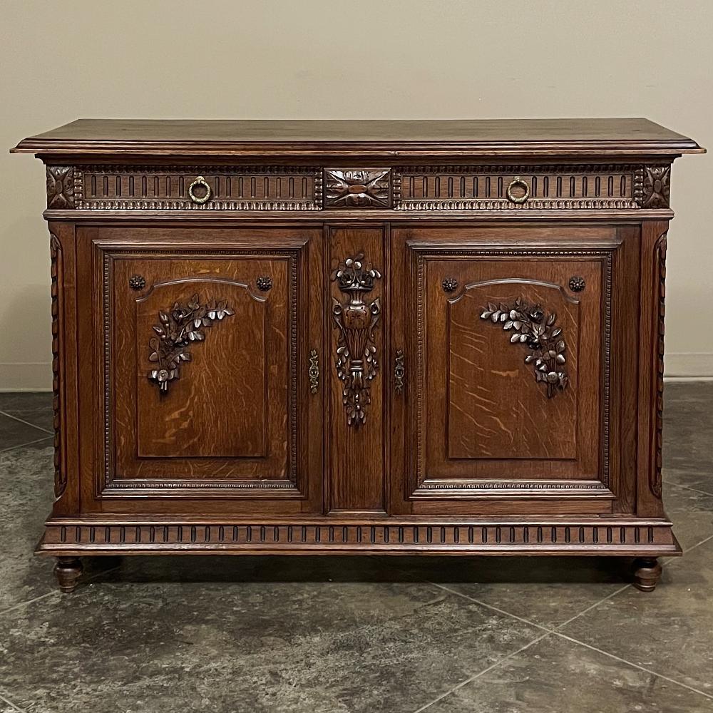 19th Century French Louis XVI buffet or sideboard was crafted with the magnificence of classic architecture and style that dates back to the ancient Greeks and Romans! The design features fine molding detail from top edge to base, with fluting,