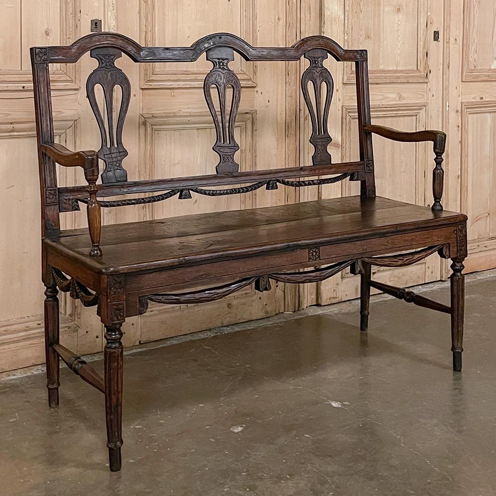 19th century French Louis XVI canape ~ Bench is a charming seat that works in the casual or formal decor, depending upon what type of cushion you select for the seat! Hand-sculpted from solid oak, it features a triple arched crown, three urn-shaped