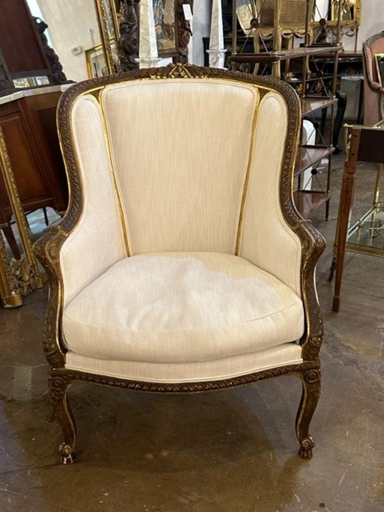 Very fine 19th century French Louis XVI carved and giltwood bergere. Featuring gorgeous carvings and nice creme colored upholstery.  Lovely!