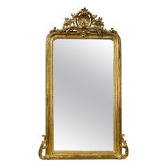 Specchio francese Luigi XVI del XIX secolo intagliato e in legno dorato