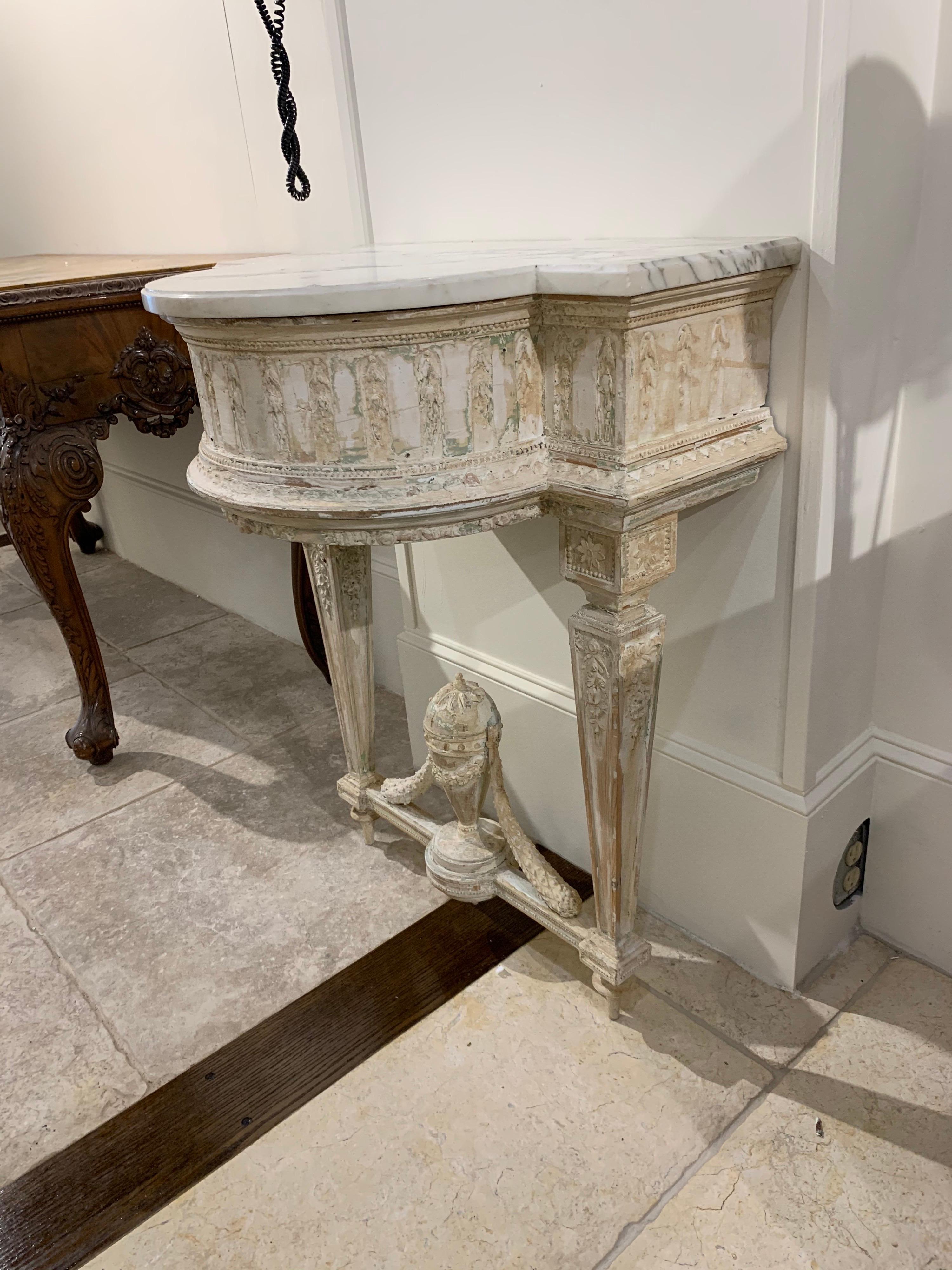Superb 19th century French Louis XVI carved and painted console with Carrara marble top. Carving is exceptional on this piece. Fabulous!!