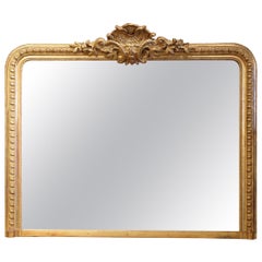 19th Century French Louis XVI Carved Giltwood Mantel Mirror with Shell Motif