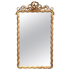 19th Century French Louis XVI Carved Giltwood Mirror with Bird and Rope Decor