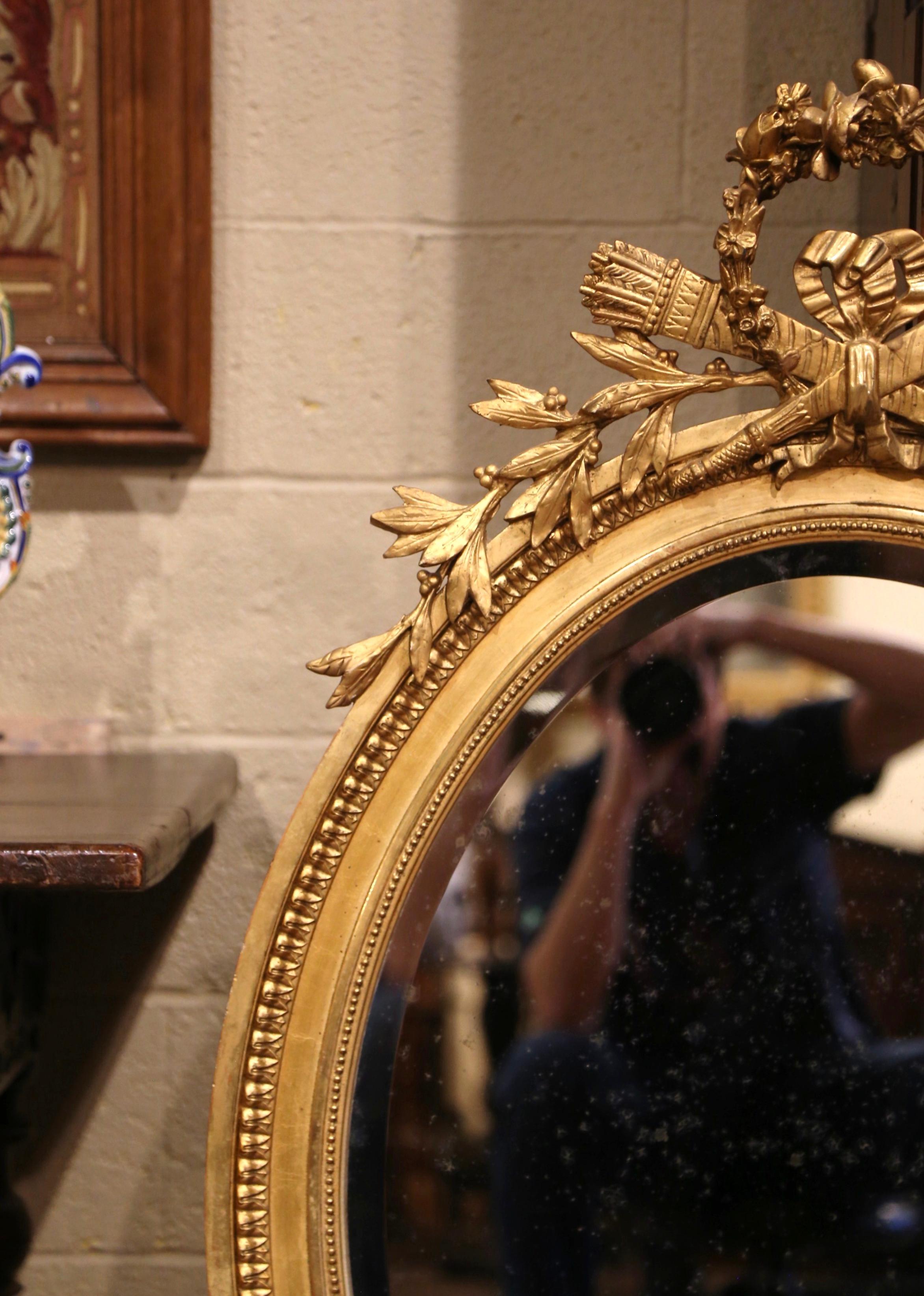 19th Century French Louis XVI Carved Giltwood Oval Beveled Glass Wall Mirror In Excellent Condition For Sale In Dallas, TX