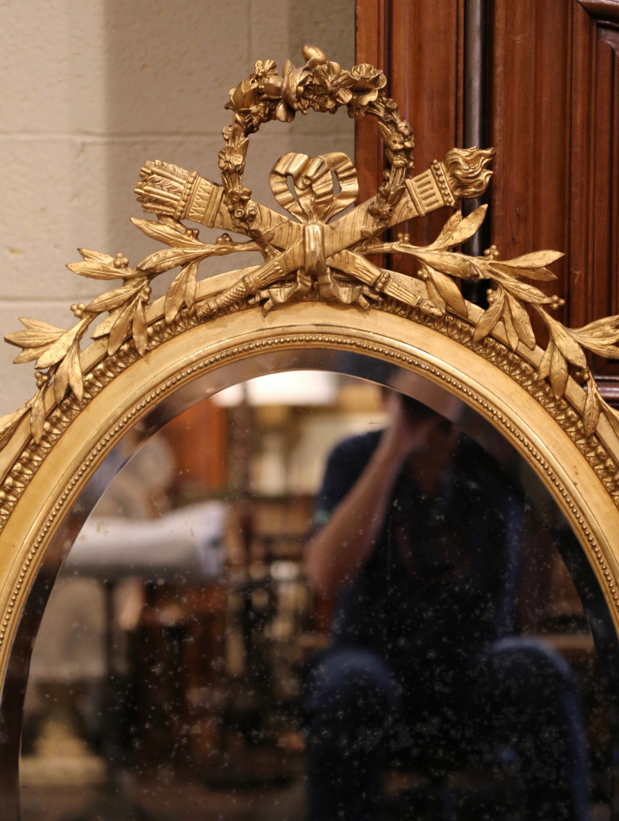 19th Century French Louis XVI Carved Giltwood Oval Beveled Glass Wall Mirror For Sale 1