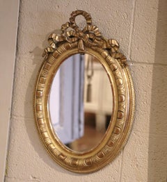 19th Century French Louis XVI Carved Giltwood Oval Wall Mirror