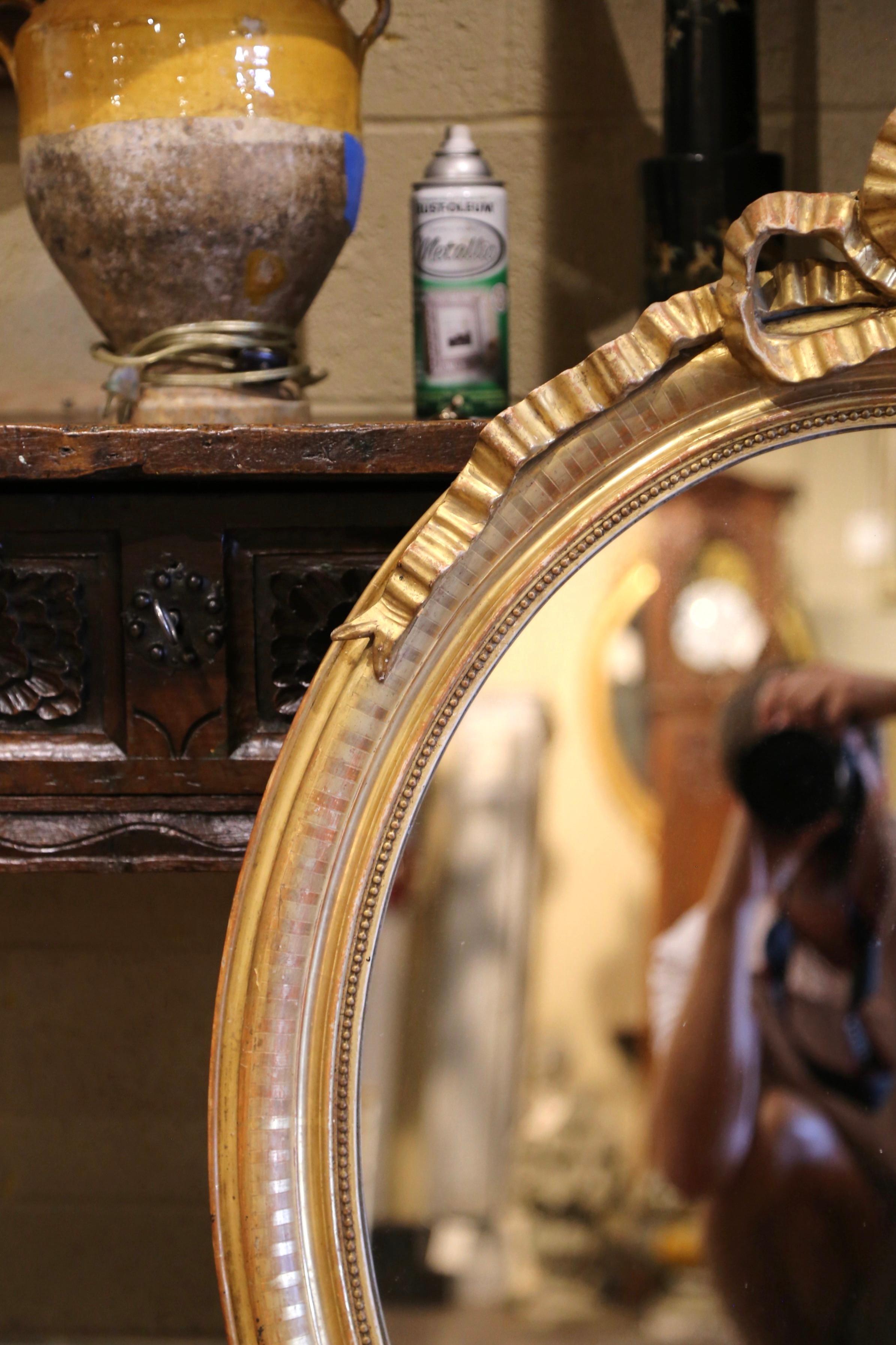 19th Century French Louis XVI Carved Giltwood Oval Wall Mirror In Excellent Condition In Dallas, TX