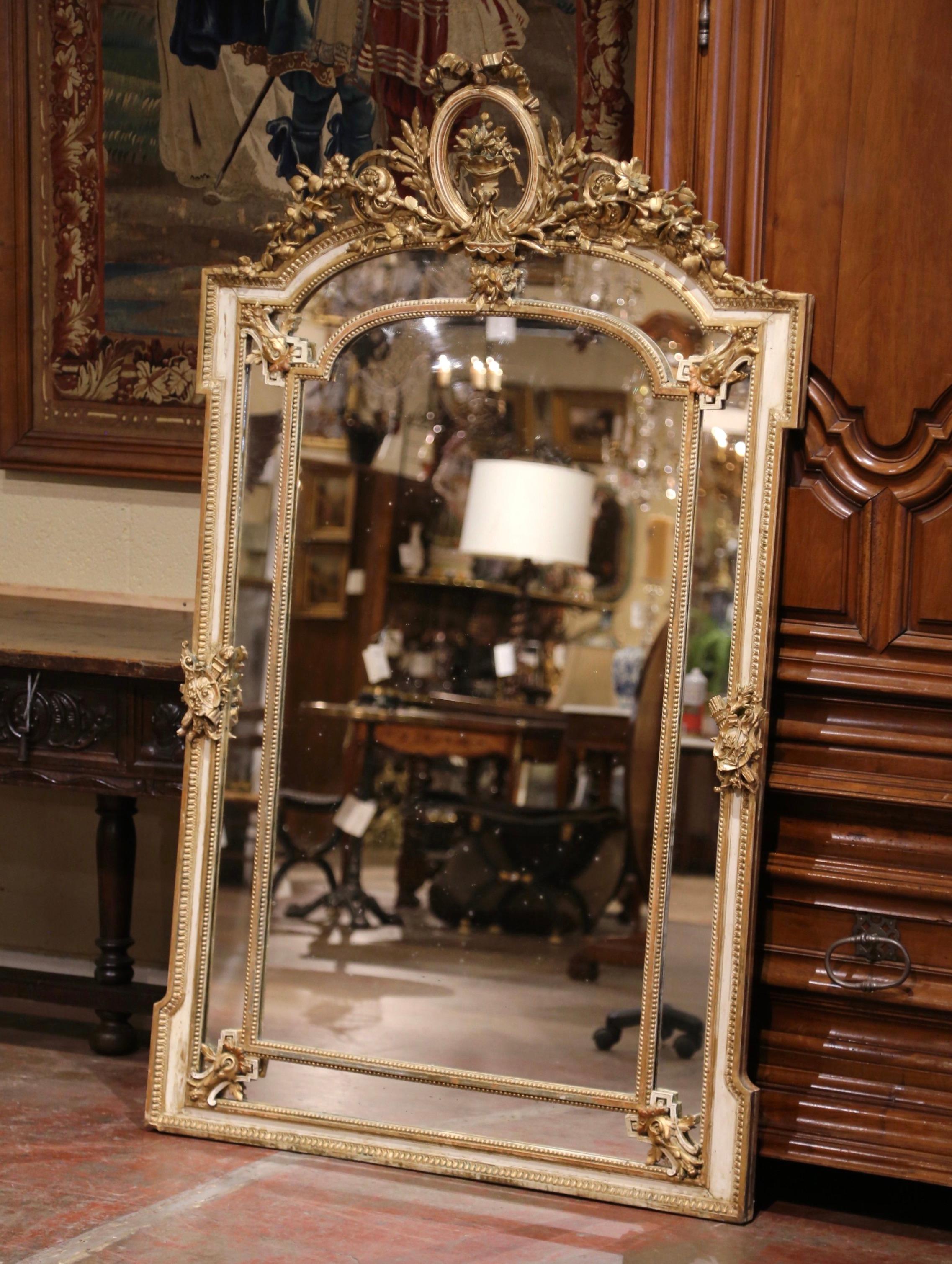 Decorate a living room or dining room with this elegant antique overlay mirror. Crafted in Provence, Southern France circa 1860, and five feet tall, the “Parclose” mirror features a nicely carved and pierced rocaille cartouche at the pediment