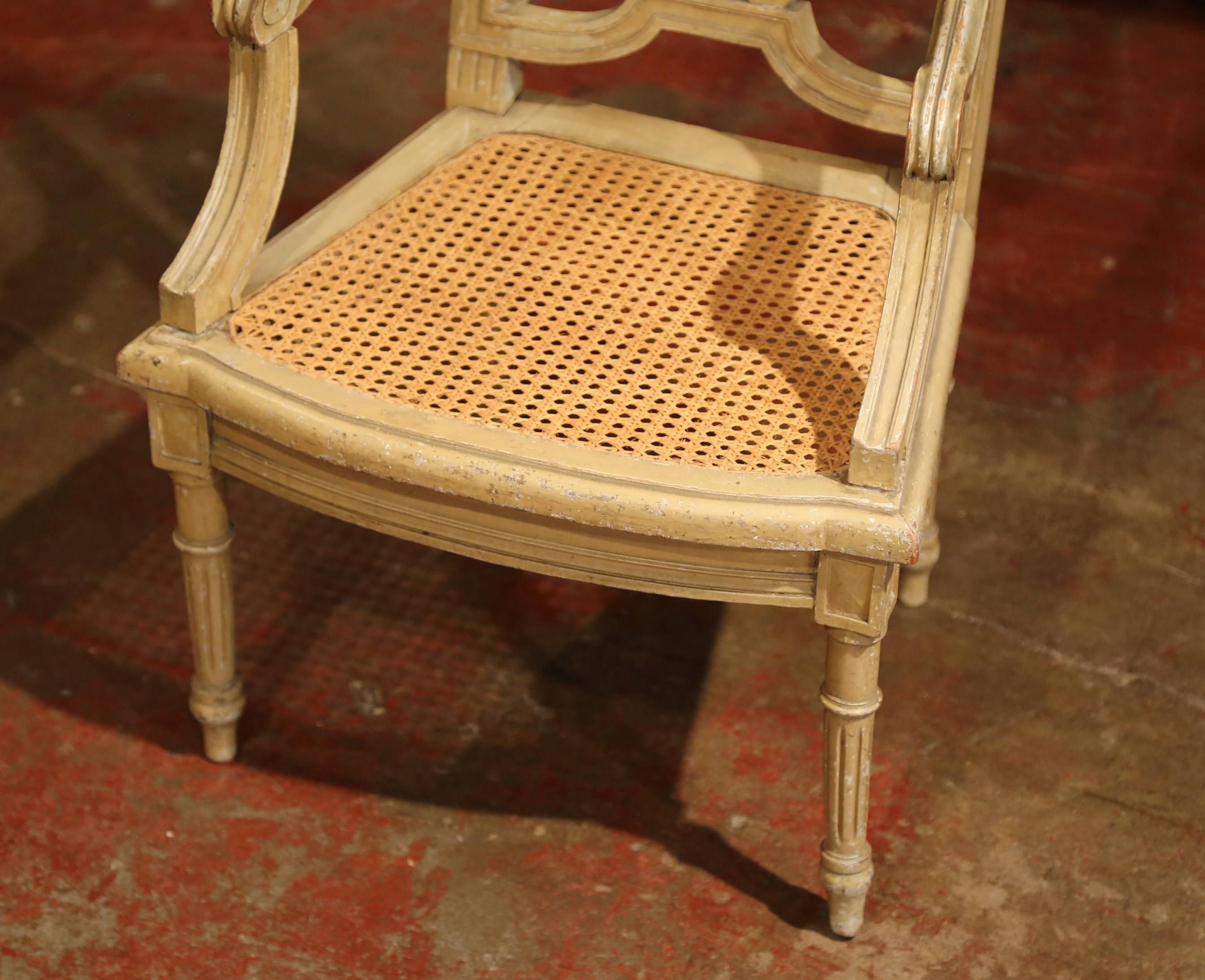 Hand-Carved 19th Century French Louis XVI Carved Painted Child Armchair with Cane Seat