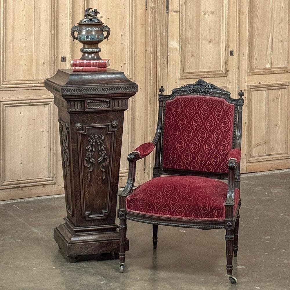 19th Century French Louis XVI Carved Pedestal is the most exquisite way to display your prized sculpture, vase or objet d'art!  Hand-crafted exclusively from old-growth quarter-sawn oak, it features an architecture inspired by the classic Greeks and