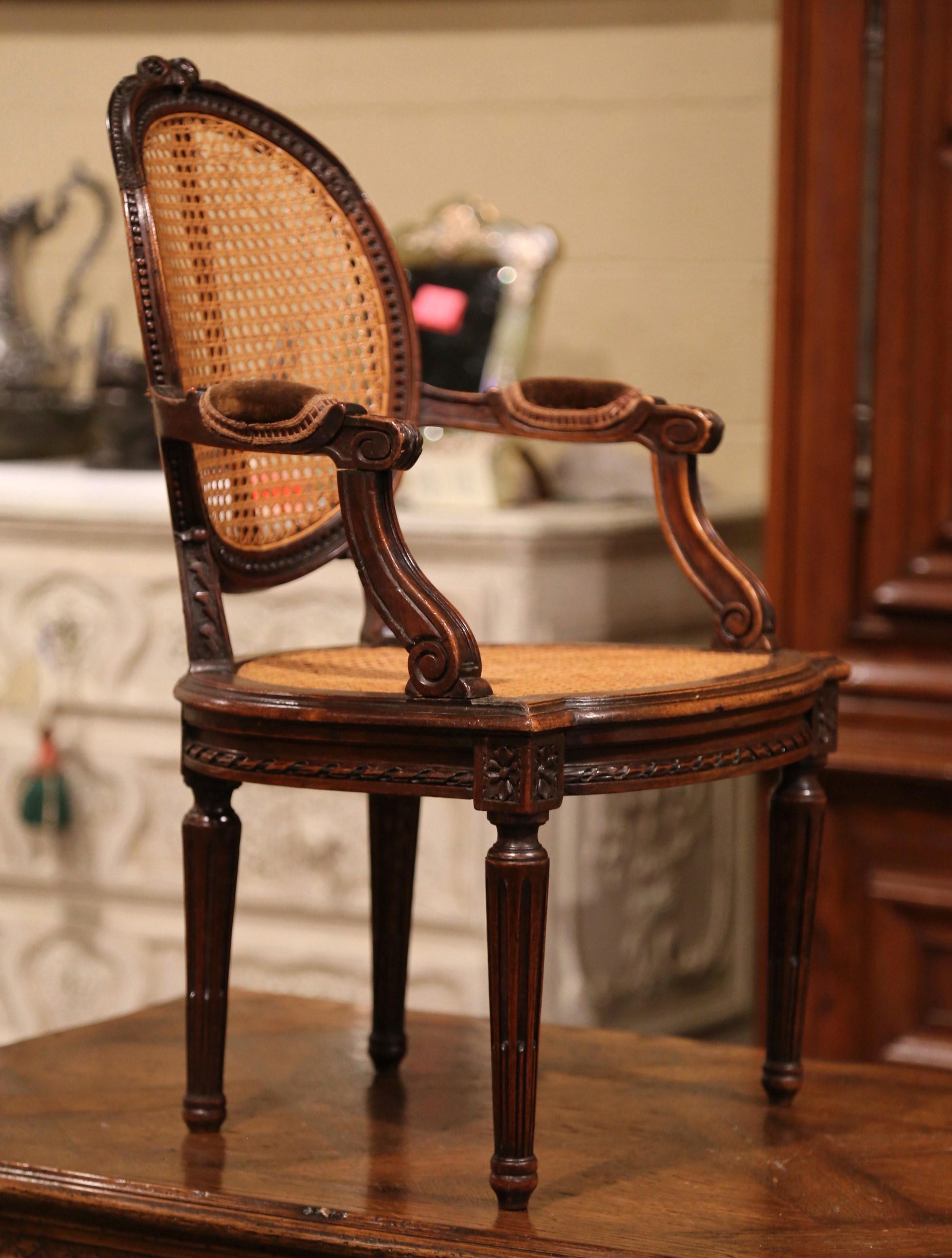19th Century French Louis XVI Carved Walnut and Cane Child Armchair In Excellent Condition In Dallas, TX
