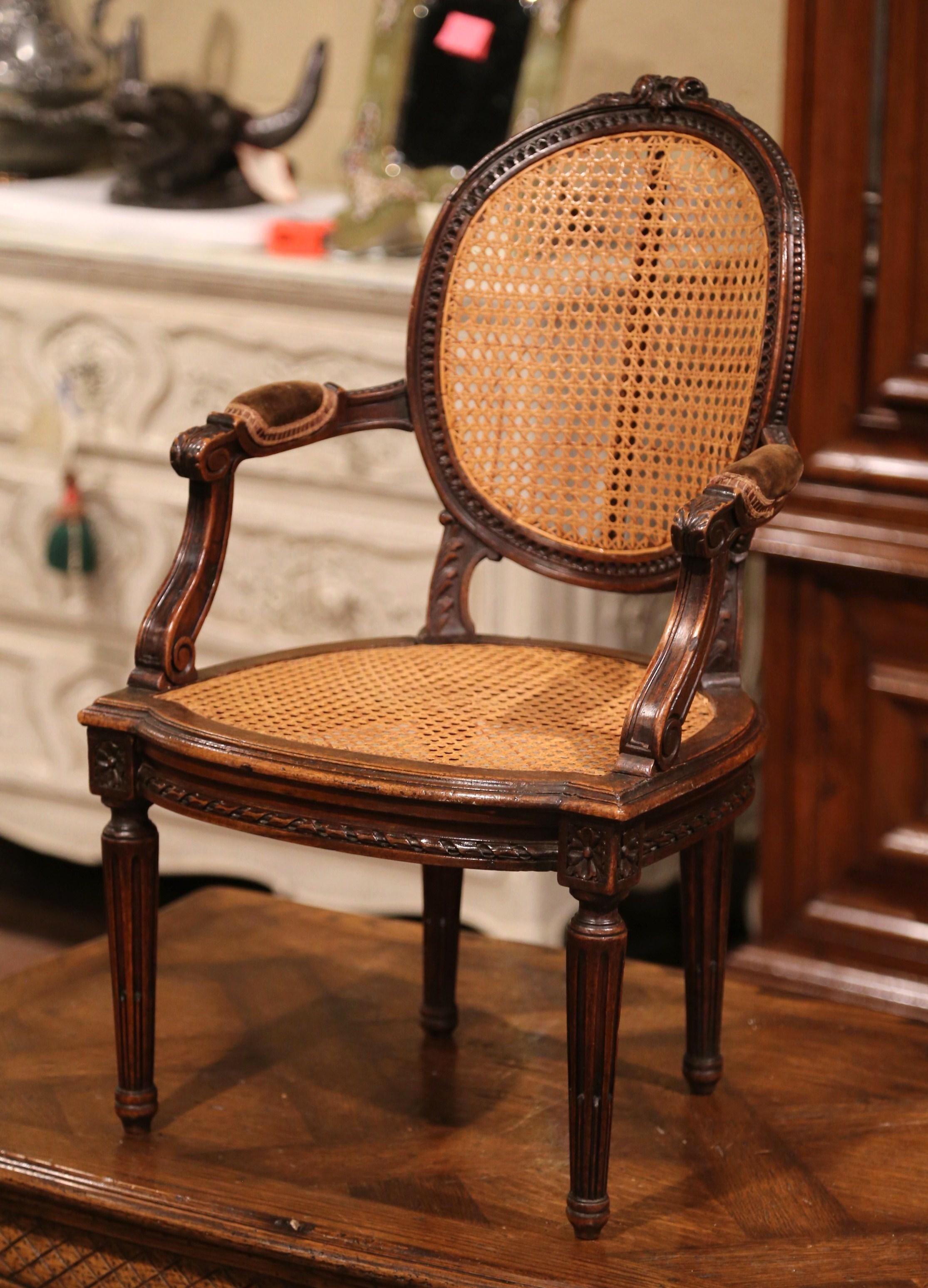 19th Century French Louis XVI Carved Walnut and Cane Child Armchair 1