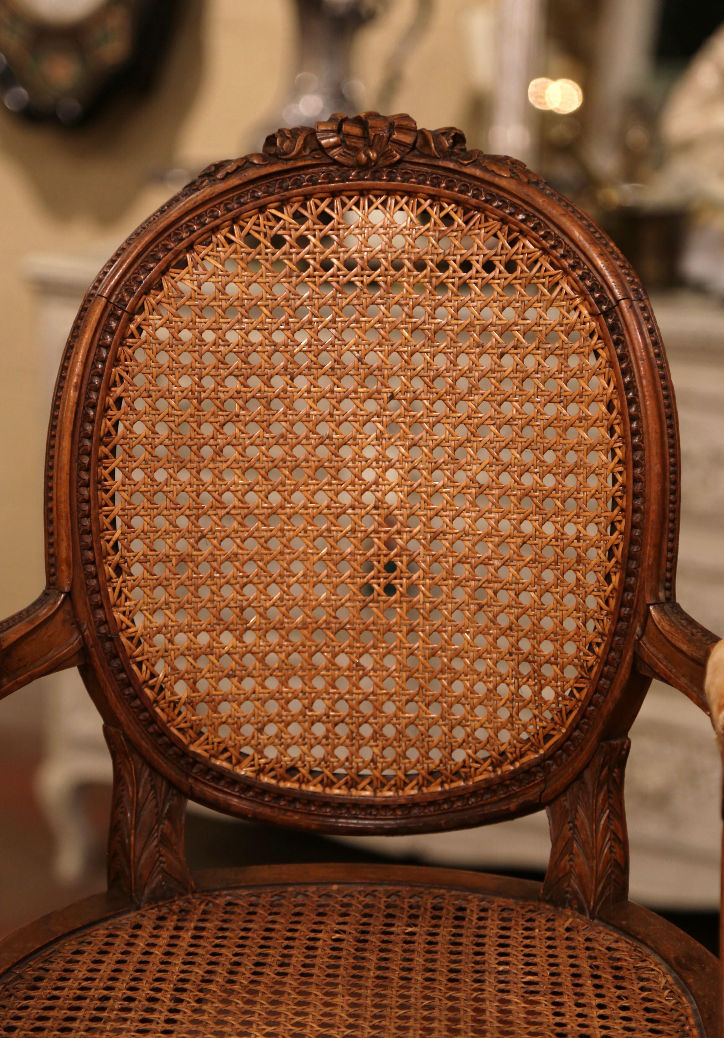 19th Century French Louis XVI Carved Walnut and Cane Child Armchair 2