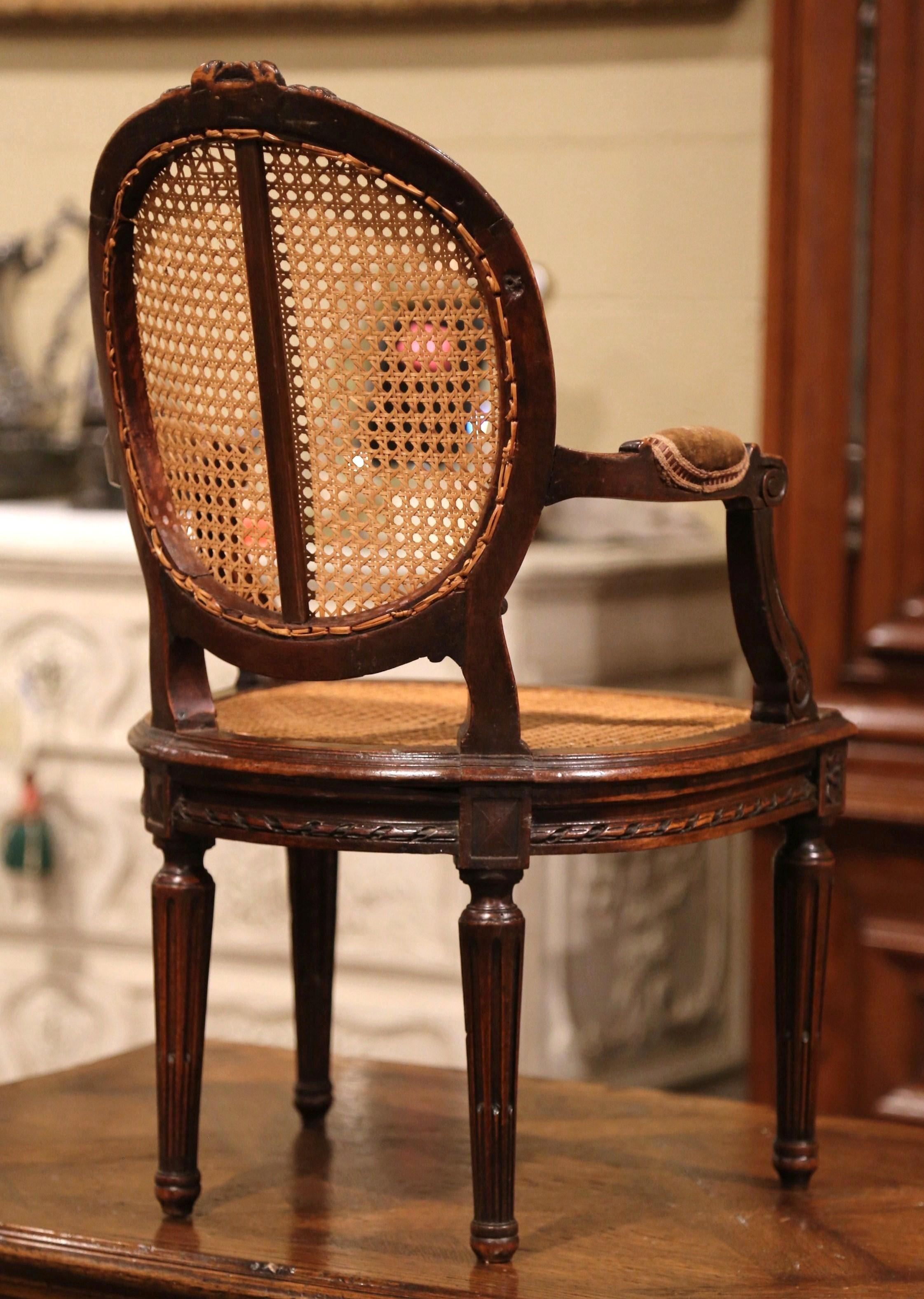 19th Century French Louis XVI Carved Walnut and Cane Child Armchair 5