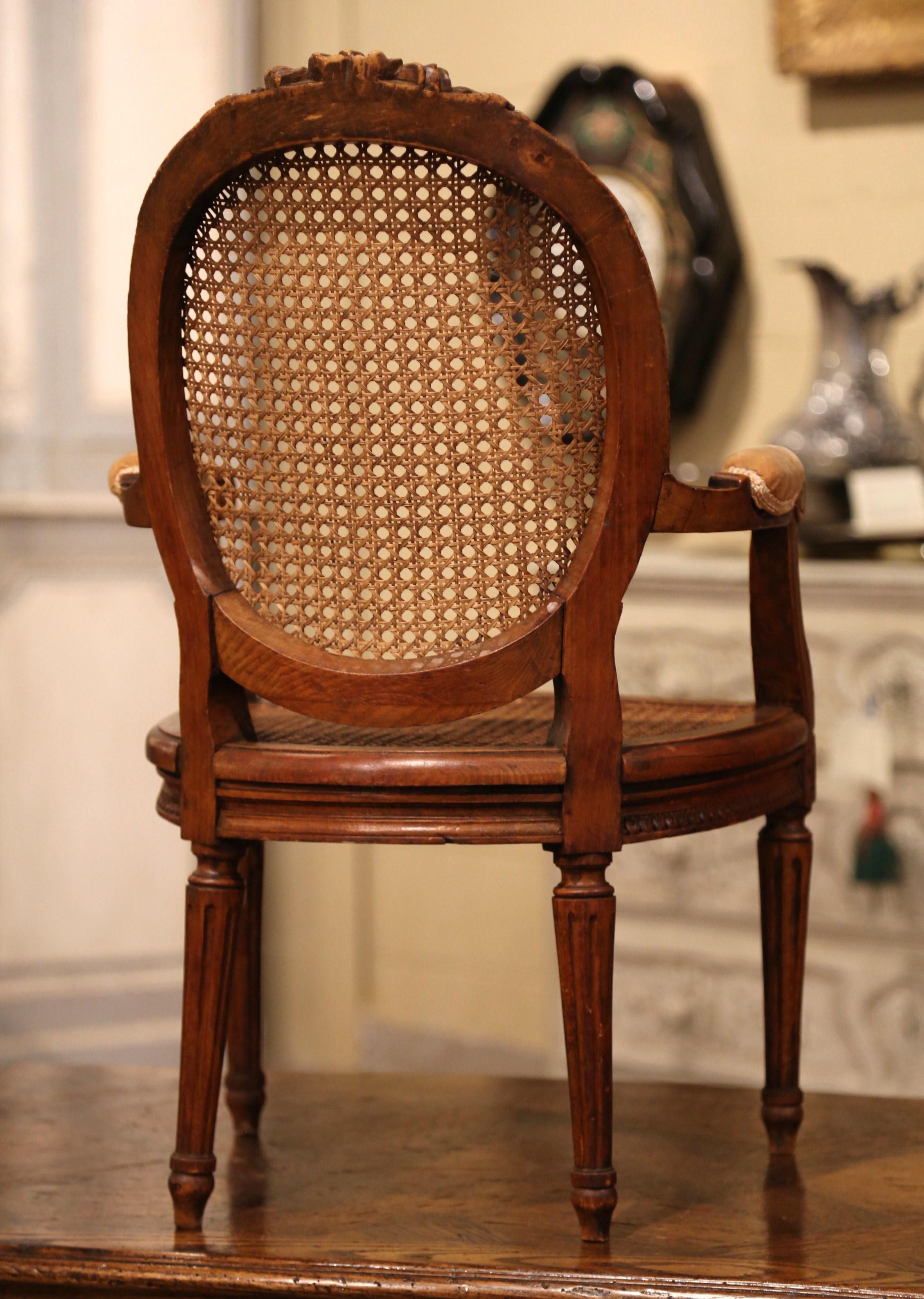 19th Century French Louis XVI Carved Walnut and Cane Child Armchair 5