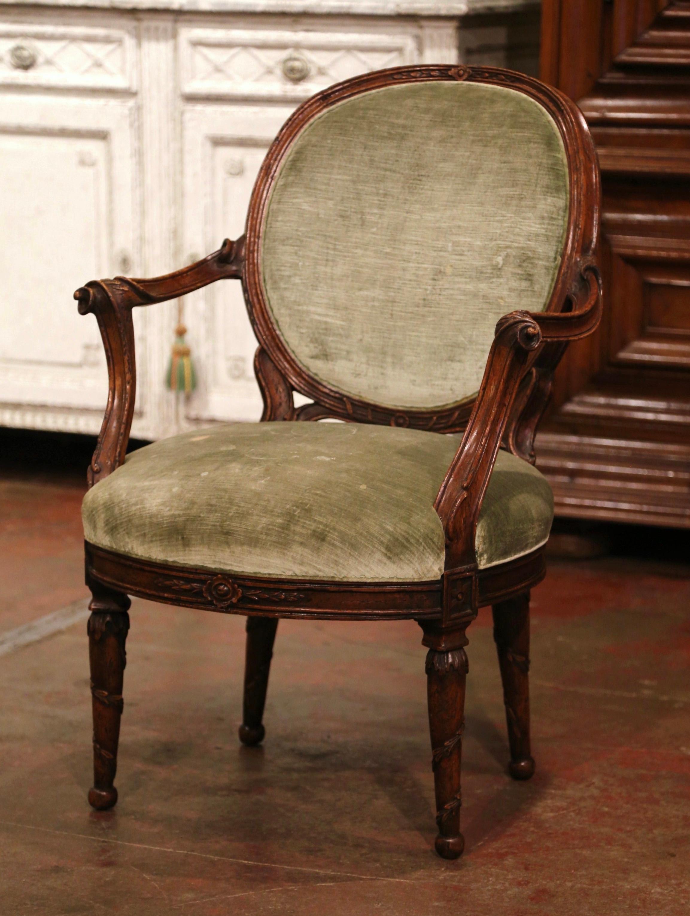19th Century French Louis XVI Carved Walnut and Velvet Bergere Armchair In Excellent Condition In Dallas, TX