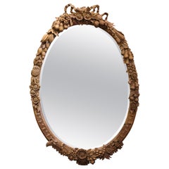 Antique 19th Century French Louis XVI Carved Walnut Mirror with Fruit & Floral Motifs
