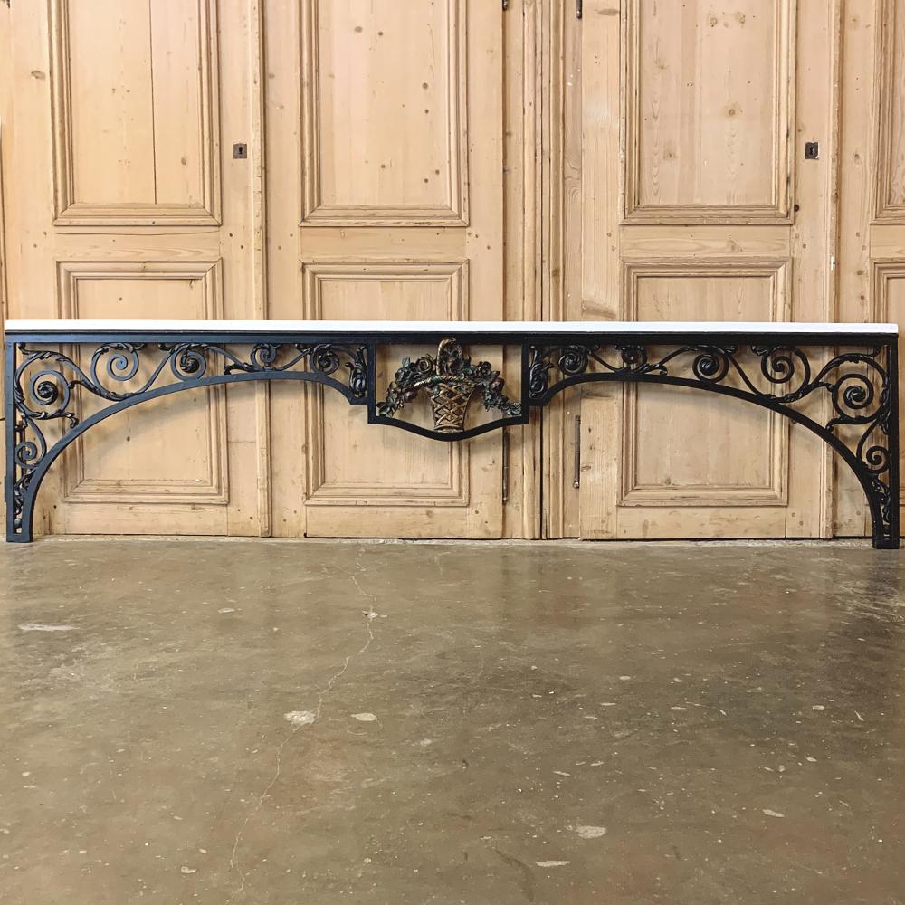 19th Century French Louis XVI Carved Wood Window Guard can certainly be used for its original purpose, but also makes a visually stunning archway or treatment for an otherwise plain cased opening.  Hand-carved with a floral basket and intricate