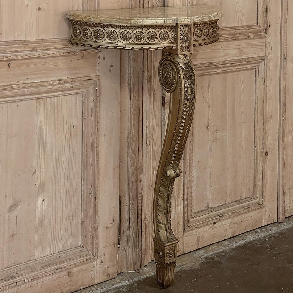 19th Century French Louis XVI Demilune giltwood marble top console makes a great choice for a diminutive space, cozy niche or small foyer wall section. Designers like them for stairwell landings, as well. Meticulously hand-carved by an obvious