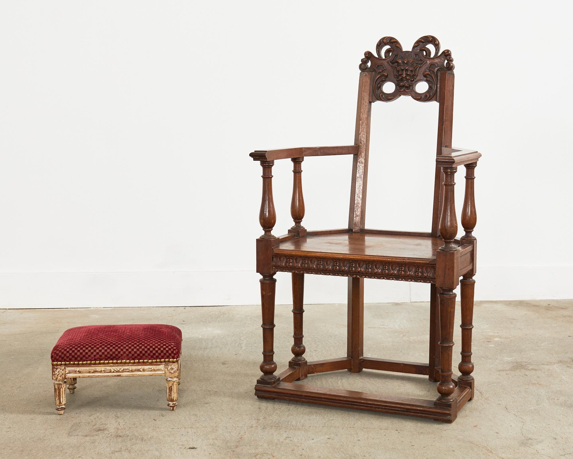 Charming diminutive or petite footstool in the French Louis XVI taste. The stool features a hand-carved painted mahogany frame with neoclassical motifs. The rectangular form is supported by fluted legs topped with square rosettes. Upholstered with a