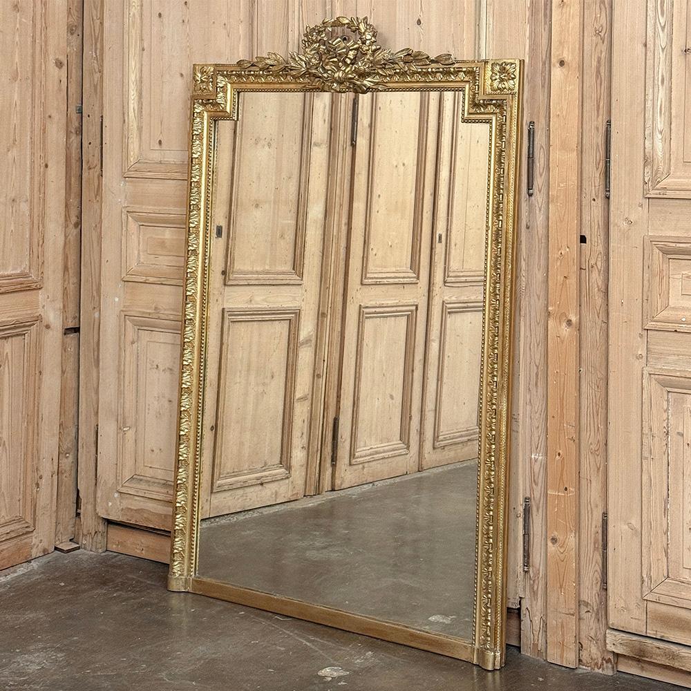 19th Century French Louis XVI Gilded Mantel Mirror is a definitive example of the neoclassical style revived in the 18th century by King Louis XVI and his name has since been synonymous with the genre.  Hand-crafted with great detail on all three