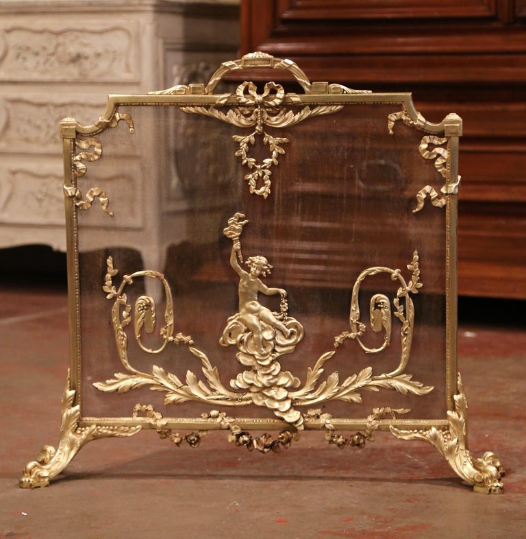 19th Century French Louis XVI Gilt Bronze Fireplace Screen with Cherub