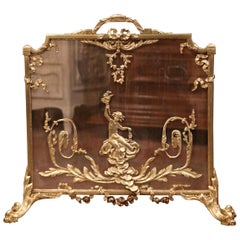 19th Century French Louis XVI Gilt Bronze Fireplace Screen with Cherub Decor