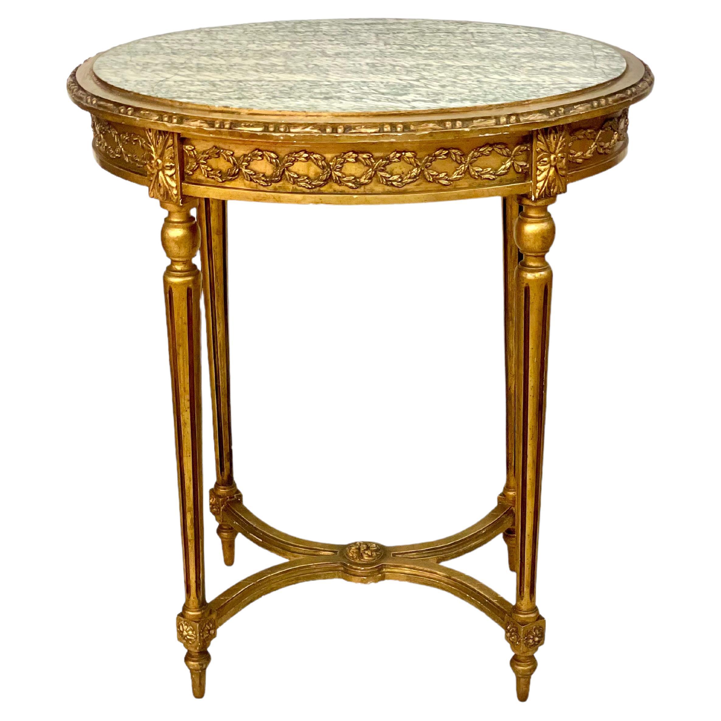 Vergoldeter französischer Louis-XVI-Mitteltisch des 19. Jahrhunderts mit Marmorplatte