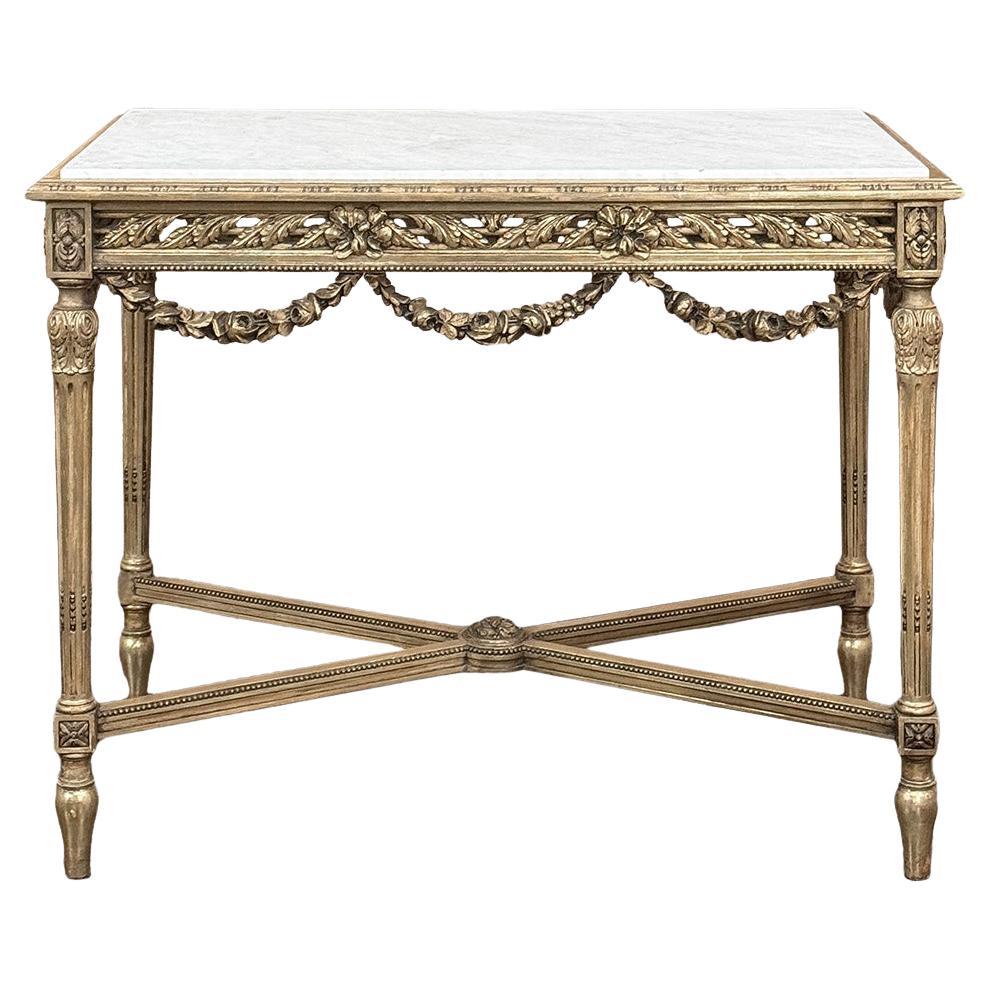 Mesa central francesa Luis XVI del siglo XIX de madera dorada con mármol de Carrara
