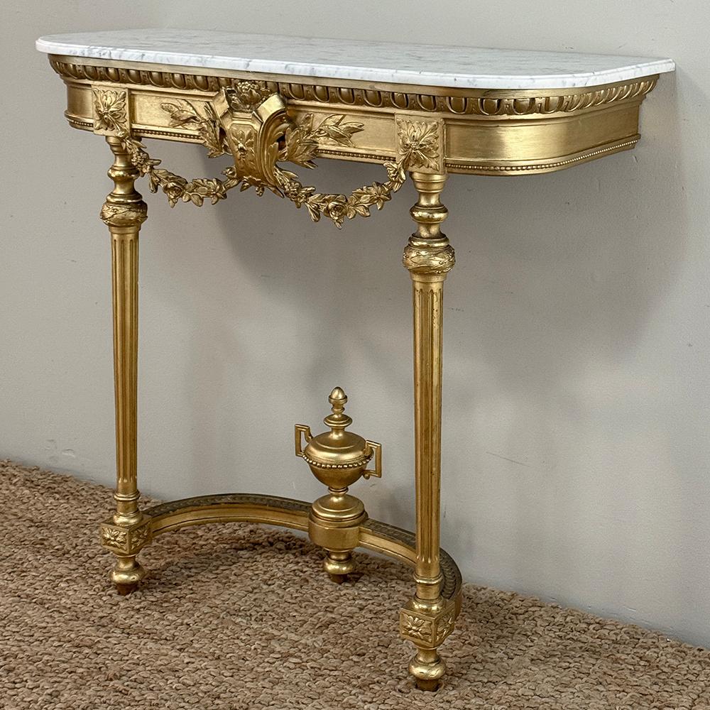 19th Century French Louis XVI Giltwood Console with Carrara Marble is an exceptional example of the style, exuding classic and timeless flair with aplomb!  The shallow depth and rounded corners of the design make it exceedingly traffic friendly,