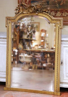 19th Century French Louis XVI Giltwood Mantel Mirror with Musical Trophy Crest