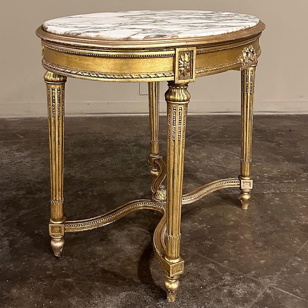 Table d'appoint ovale Louis XVI du 19ème siècle en bois doré avec plateau en marbre en vente 1
