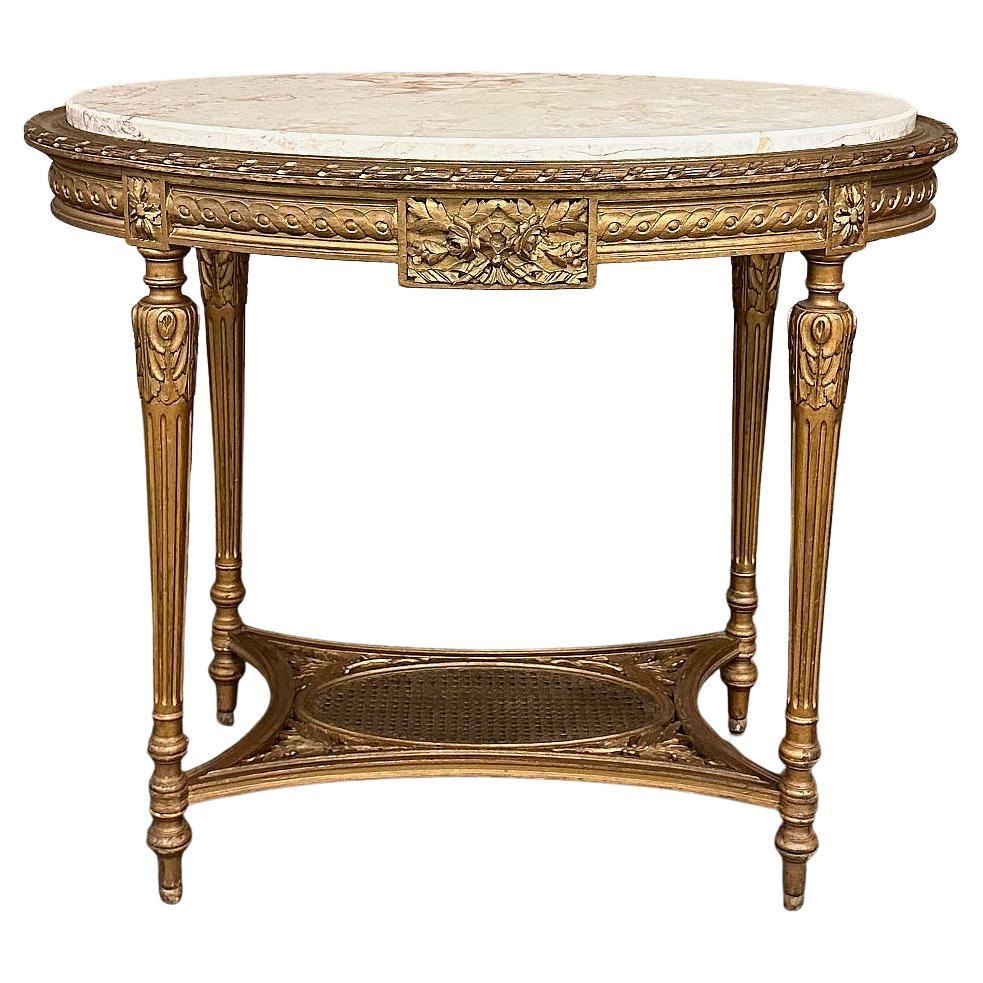 Table d'appoint ovale Louis XVI du 19ème siècle en bois doré avec plateau en marbre