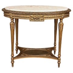 Table d'appoint ovale Louis XVI du 19ème siècle en bois doré avec plateau en marbre