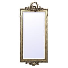Espejo francés de madera dorada Luis XVI del siglo XIX
