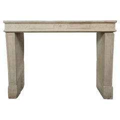 19th Century French Louis XVI Limestone Fireplace Mantel