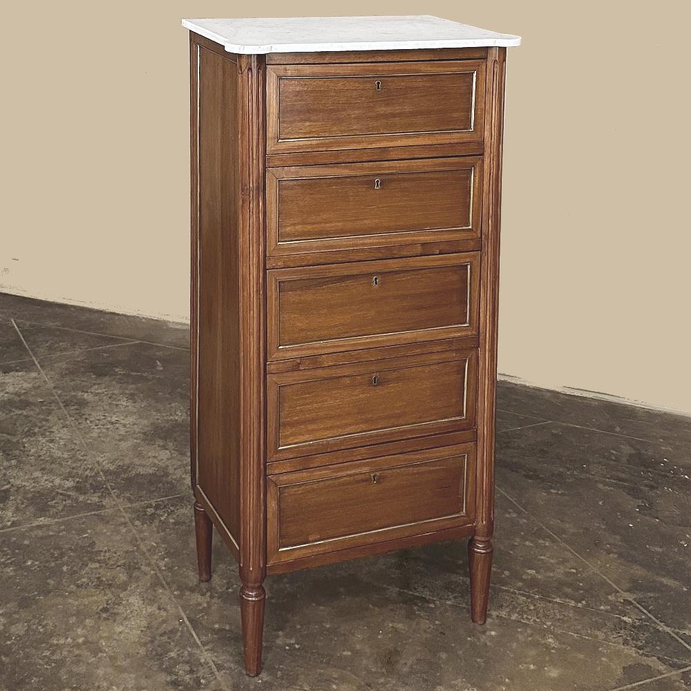 19th Century French Louis XVI Mahogany Chiffoniere with Carrara Marble Top is the perfect solution for providing lots of organizational storage in a very small floor footprint while adding tailored, classical style to the room!  Crafted from exotic
