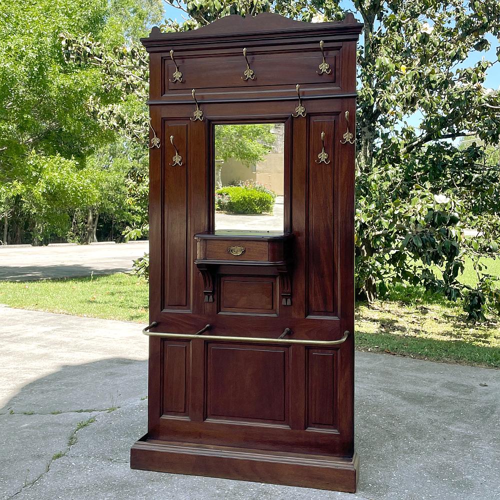 19th century French Louis XVI mahogany hall tree is the ideal choice for any entryway, especially the one the family uses the most. It's a great piece to hang on to your outerwear and freshen up a bit as you enter, or as you arrive. This example