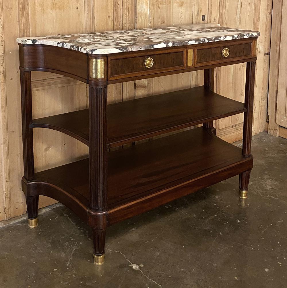 19th century French Louis XVI marble top buffet ~ server is a seminal piece from the master artisans of Paris during the Belle Epoque! Utilizing only the finest exotic imported mahogany, the ebenistes carefully shaped the piece to its final form,