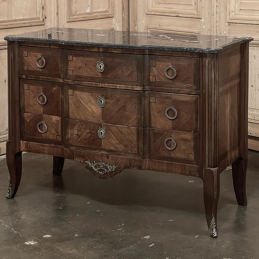 19th Century French Louis XVI Marble Top Mahogany Commode will make an elegant addittion to any room!  Hand-crafted in the neoclassic style favored by King Louis XVI and Queen Marie Antoinette, it features a subtly complex case contour that includes