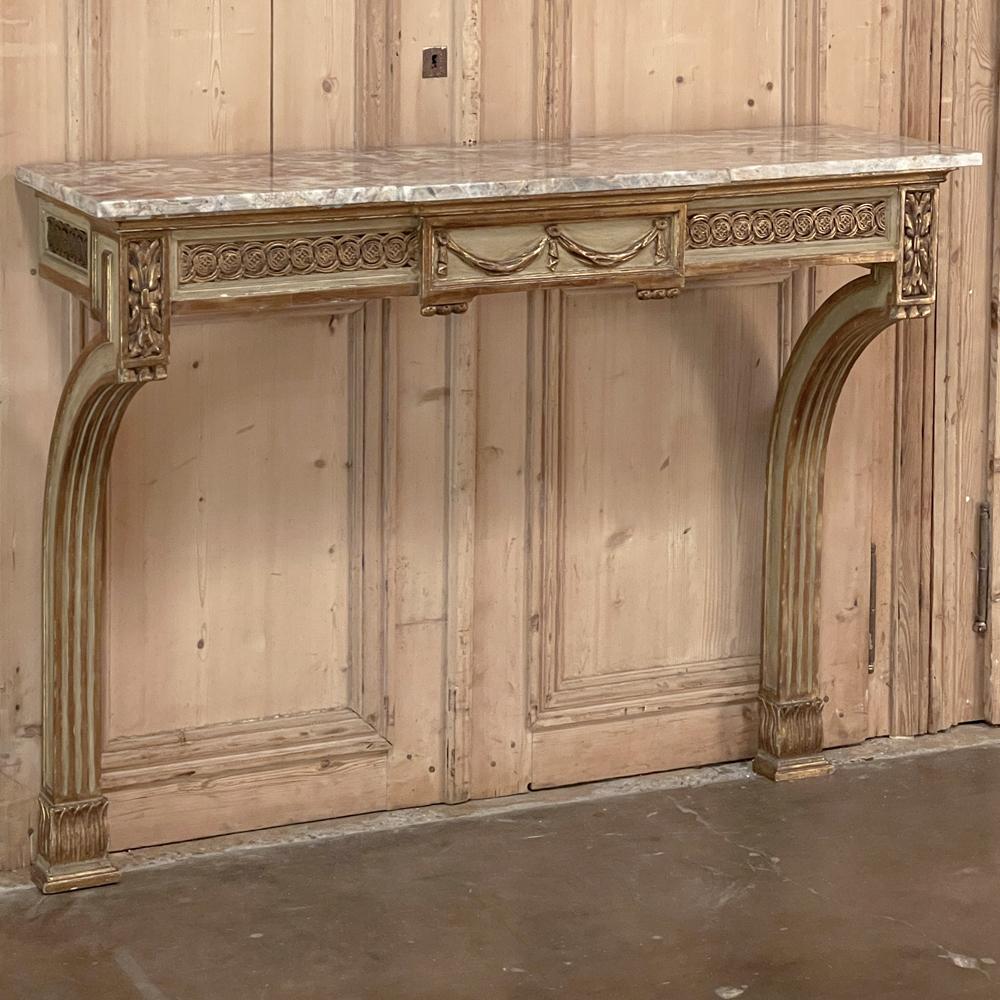 19th Century French Louis XVI marble top painted console is the ideal choice to create a stunning entryway, adorn a stairway landing, or create visual interest in a hallway. Classical Greek architecture is critical to the design, with elegantly