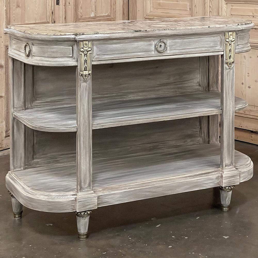 19th Century French Louis XVI Marble Top Whitewashed Dessert Buffet represents the apex of tailored design!  Inspired by classical Greek and Roman architecture, it features a rectilinear design combined with rounded sides that eliminate sharp