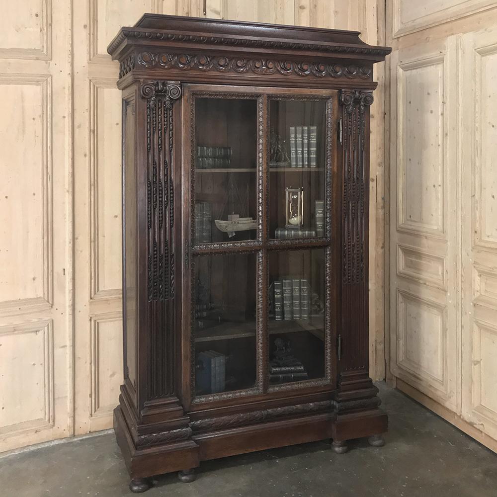 19th century French Louis XVI bookcase features classical motifs revived once again during the latter years of the 1800s, a period that saw a flood of historical perspectives re-entering the style scene, thanks primarily to the French influence.