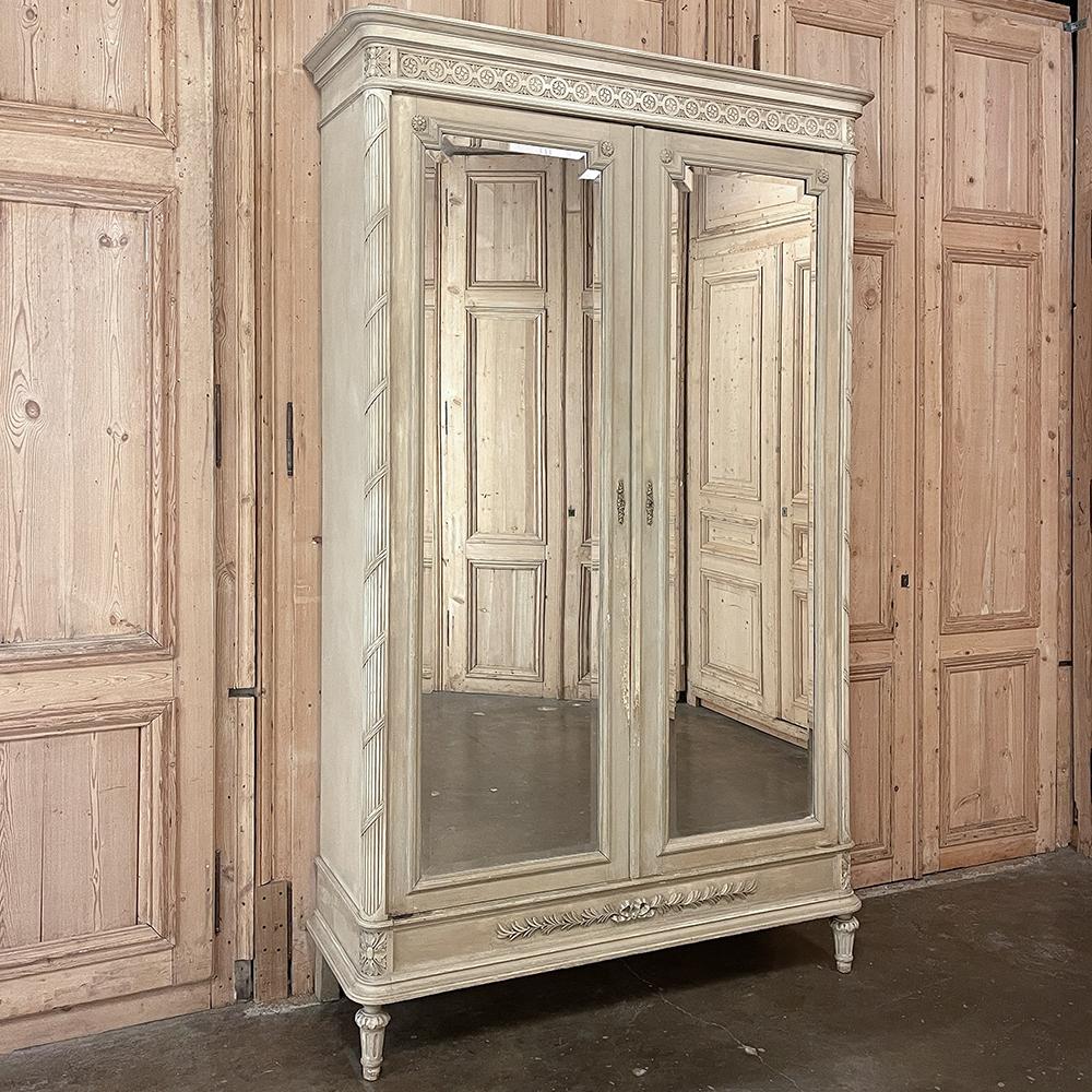 19th century French Louis XVI Neoclassical Painted Armoire ~ Wardrobe defines the Neoclassical Revival during the Belle Epoque to a fantastic degree of artistry! The stately architecture inspired by ancient Greek and Roman masters is evident in the