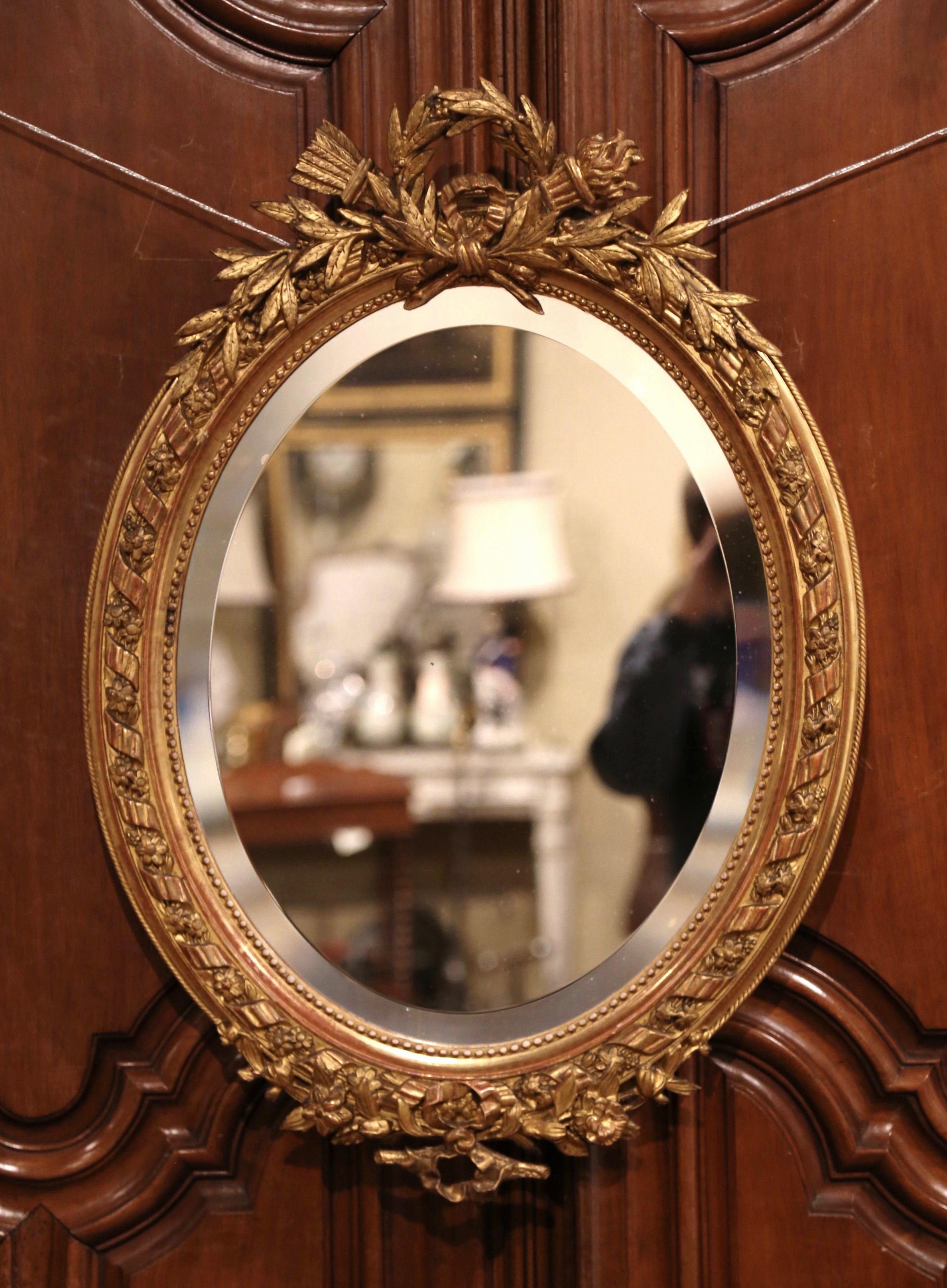 19th Century French Louis XVI Oval Carved Giltwood and Beveled Glass Mirror In Excellent Condition In Dallas, TX