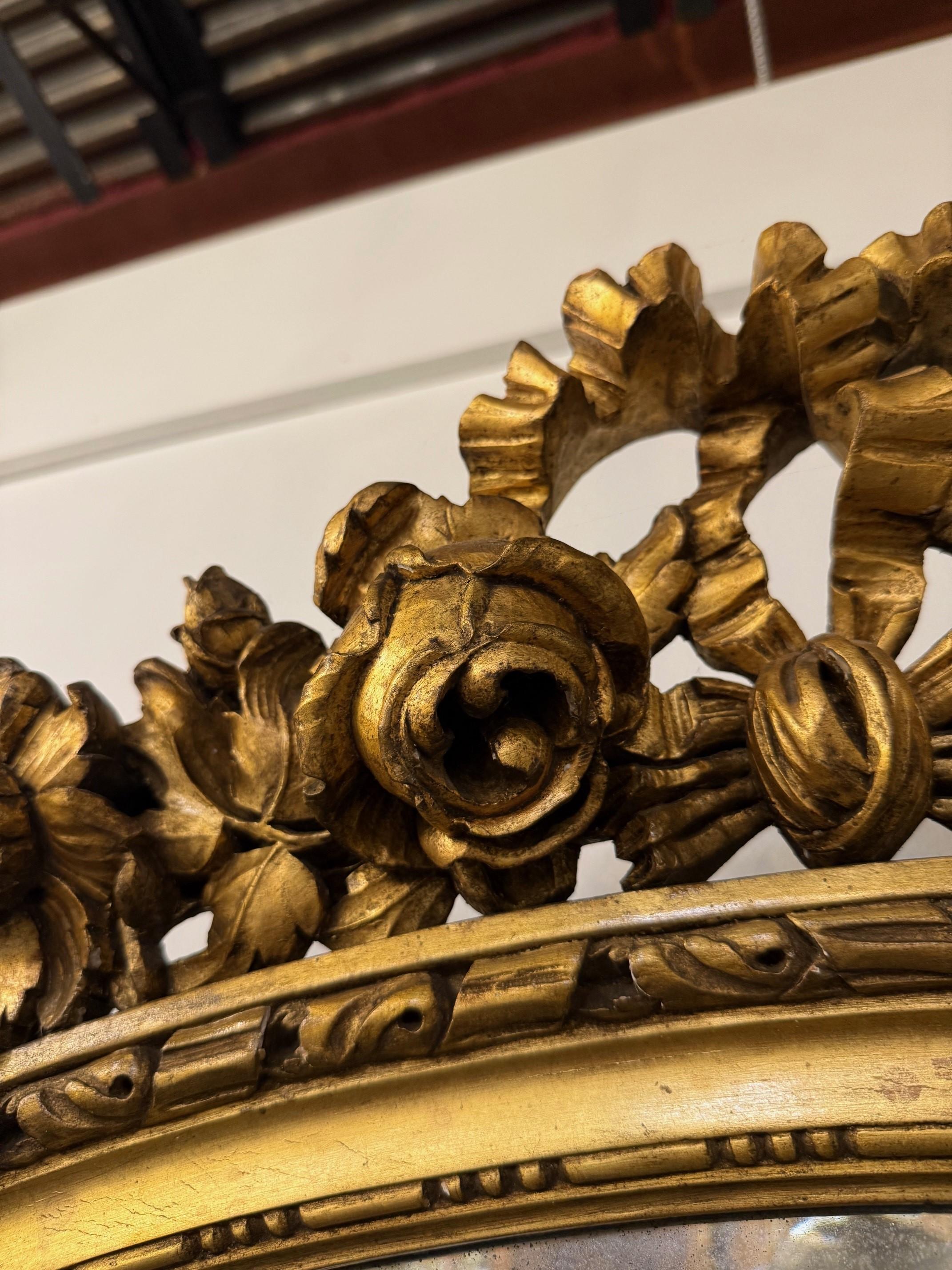 Miroir ovale français Louis XVI du XIXe siècle en bois doré en vente 8