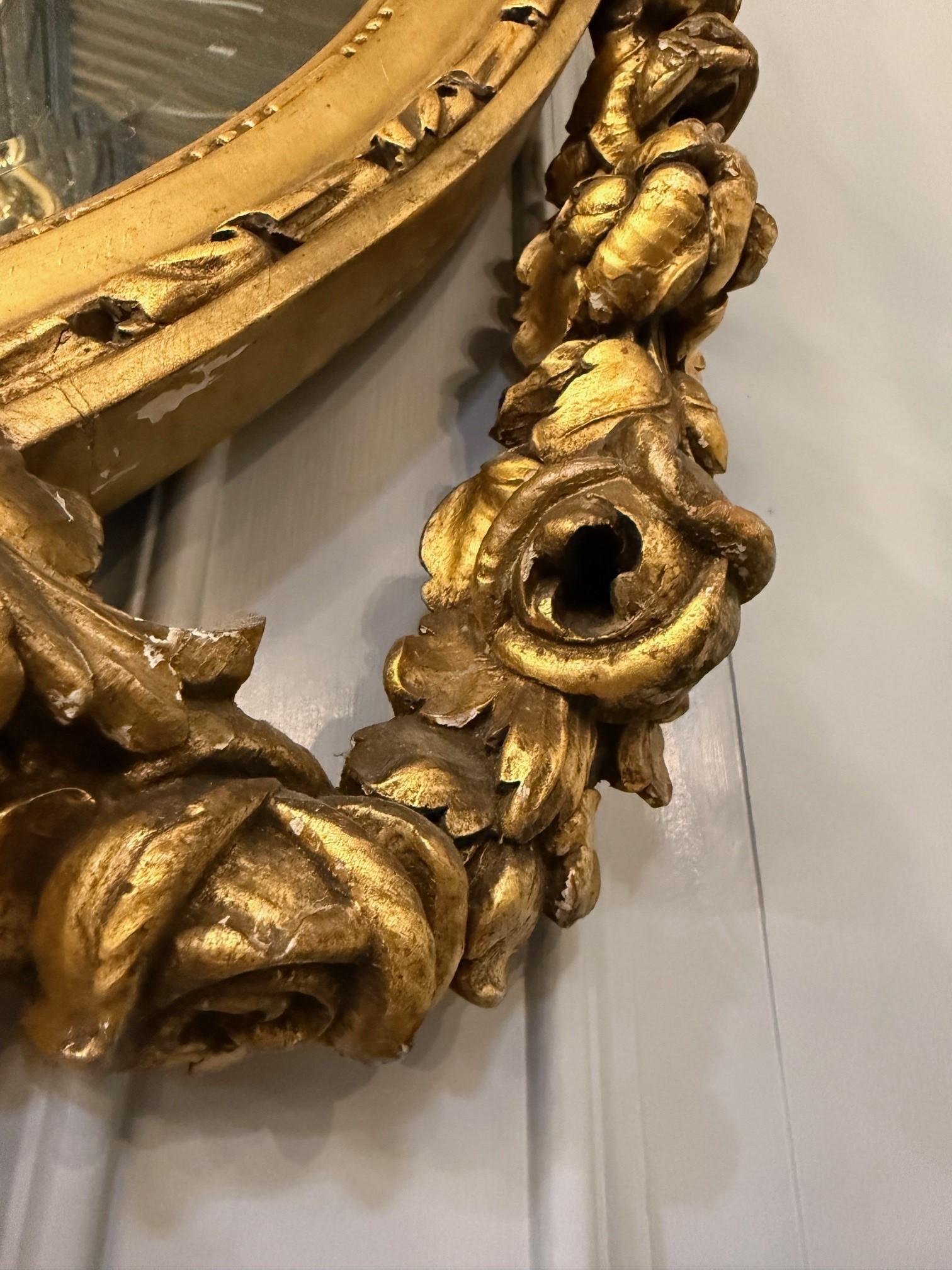 Miroir ovale français Louis XVI du XIXe siècle en bois doré en vente 9